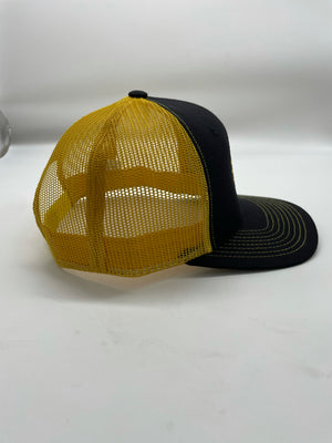 Pressure back Junkiez snap Black/yellow trucker logo hat.
