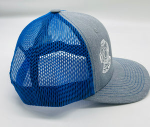 Blue/ gray snap back trucker hat. White dive hat, white writing.