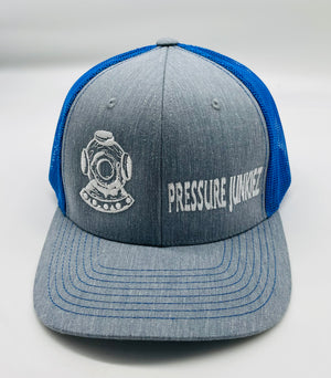 Blue/ gray snap back trucker hat. White dive hat, white writing.